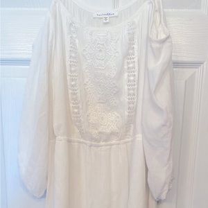 White thigh length dress